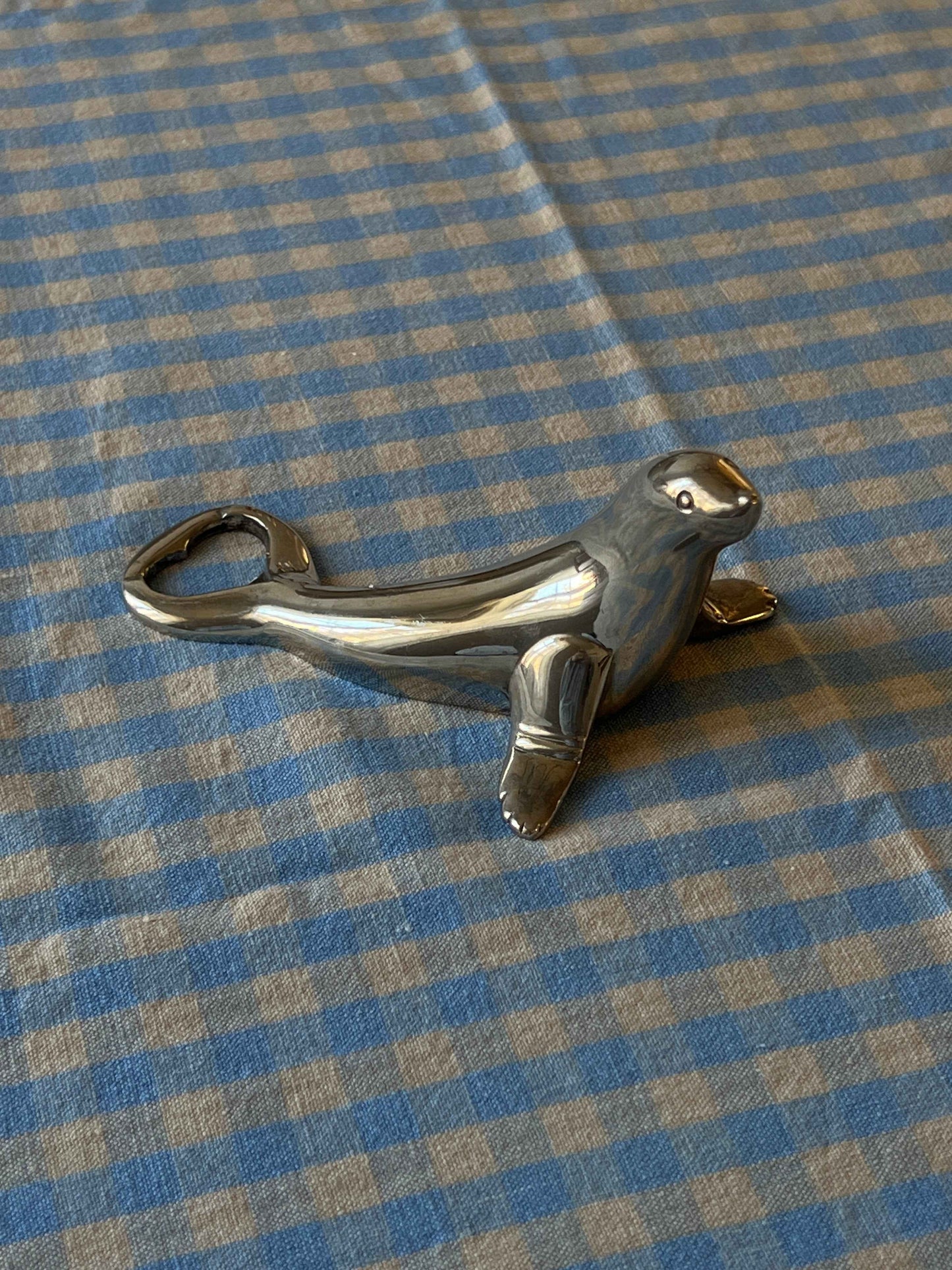 Oplukker i sølv - søløvemotiv