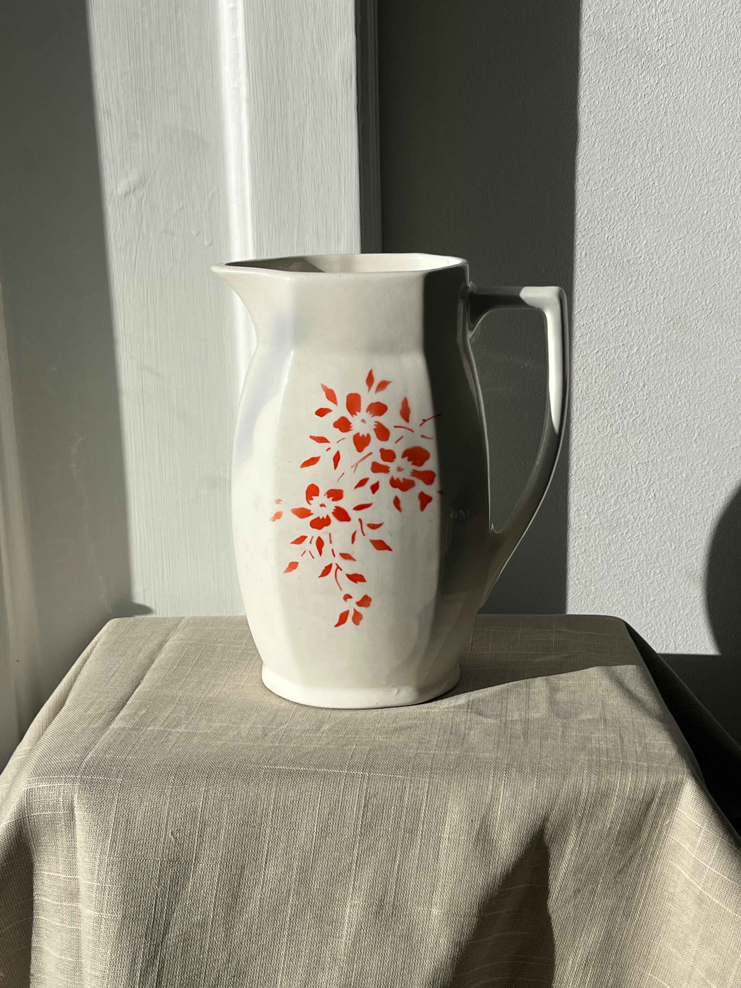 Vintage kande med rødt/orange blomstermotiv