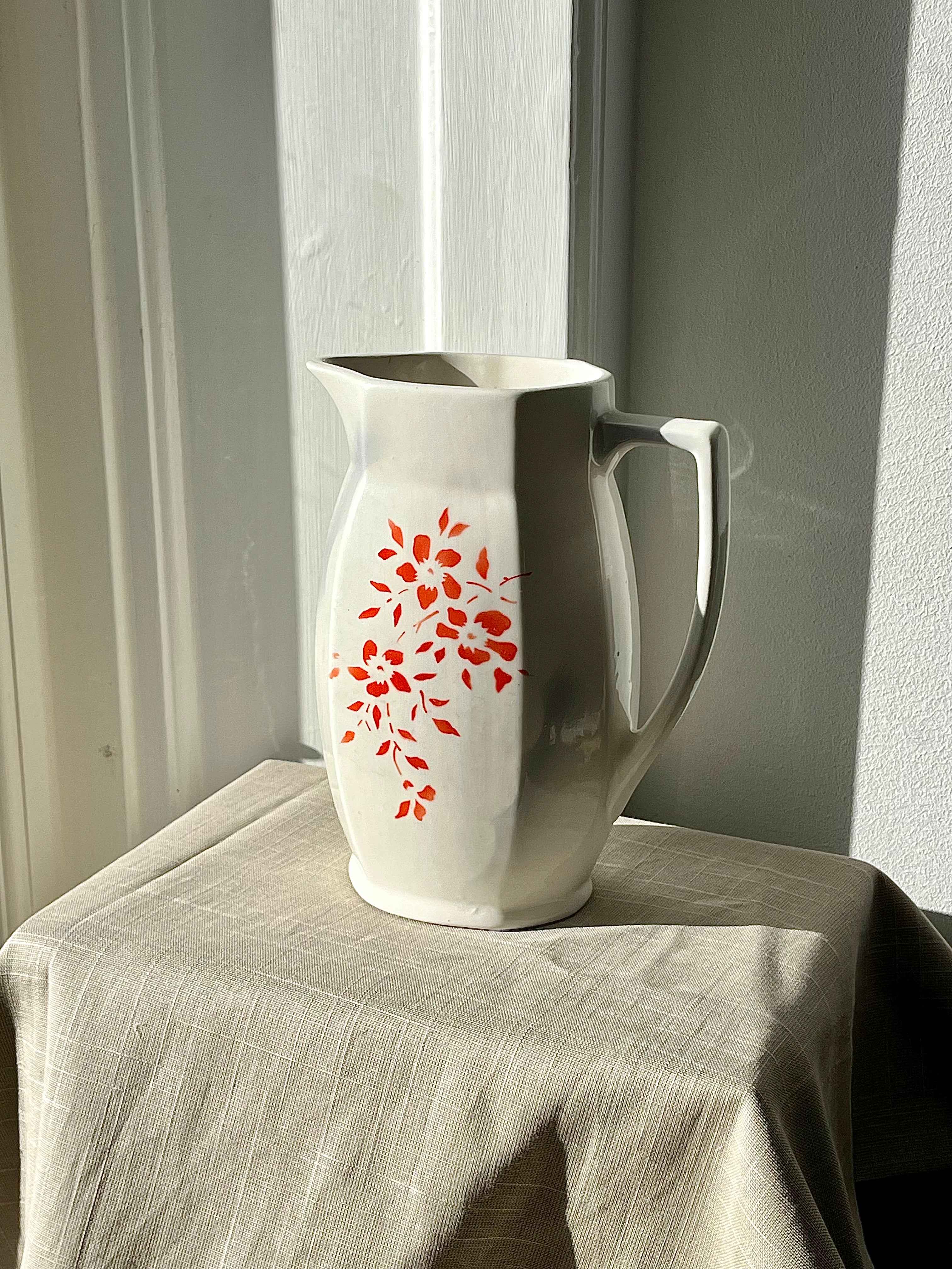 Vintage kande med rødt/orange blomstermotiv