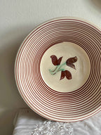 Lerfad med striber og blomstret motiv